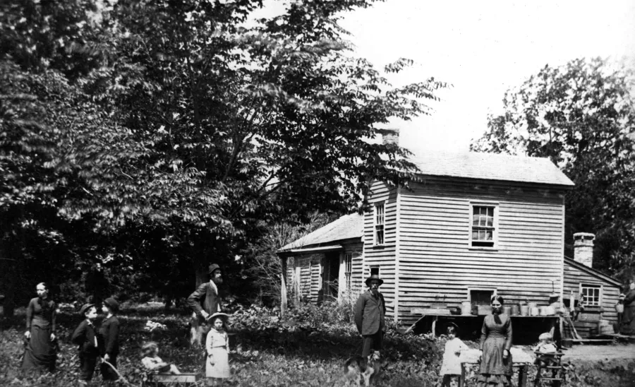 At the time of this photo, Mary and Jacob’s family had grown considerably. His children were all married and had their own children. His wife is in the background to the far right, he is center front.