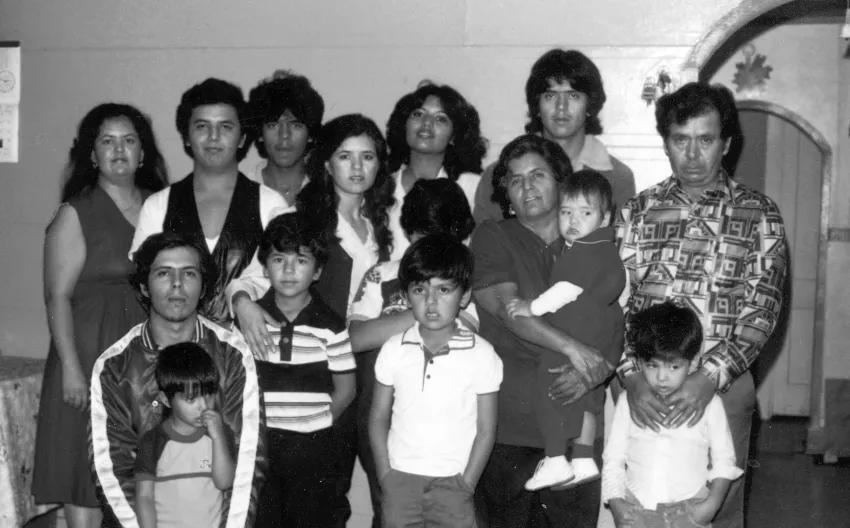 This family portrait, taken at Emilia and Jose Luna’s Bloomington home around 1980, includes all their children and two grandchildren.