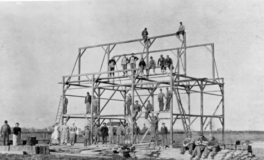 When the Rowland family needed a new barn, all the men pitched in to get it done. The women did their part by making sure everyone was well fed.