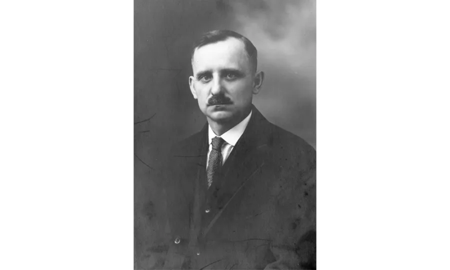 portrait of white man with mustache