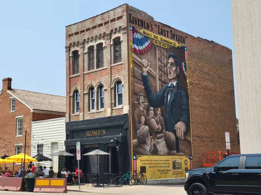 Historic brick building on Lincoln's Lost Precinct with 