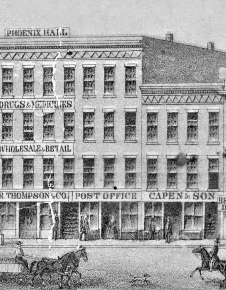 Historical engraving of a multi-story commercial building labeled 